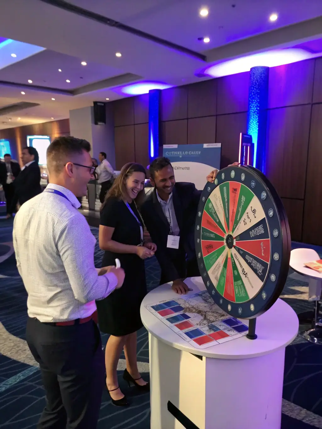 A dynamic shot of the 360 photo booth in action at a corporate event, showing attendees creating slow-motion videos with branded overlays and music.